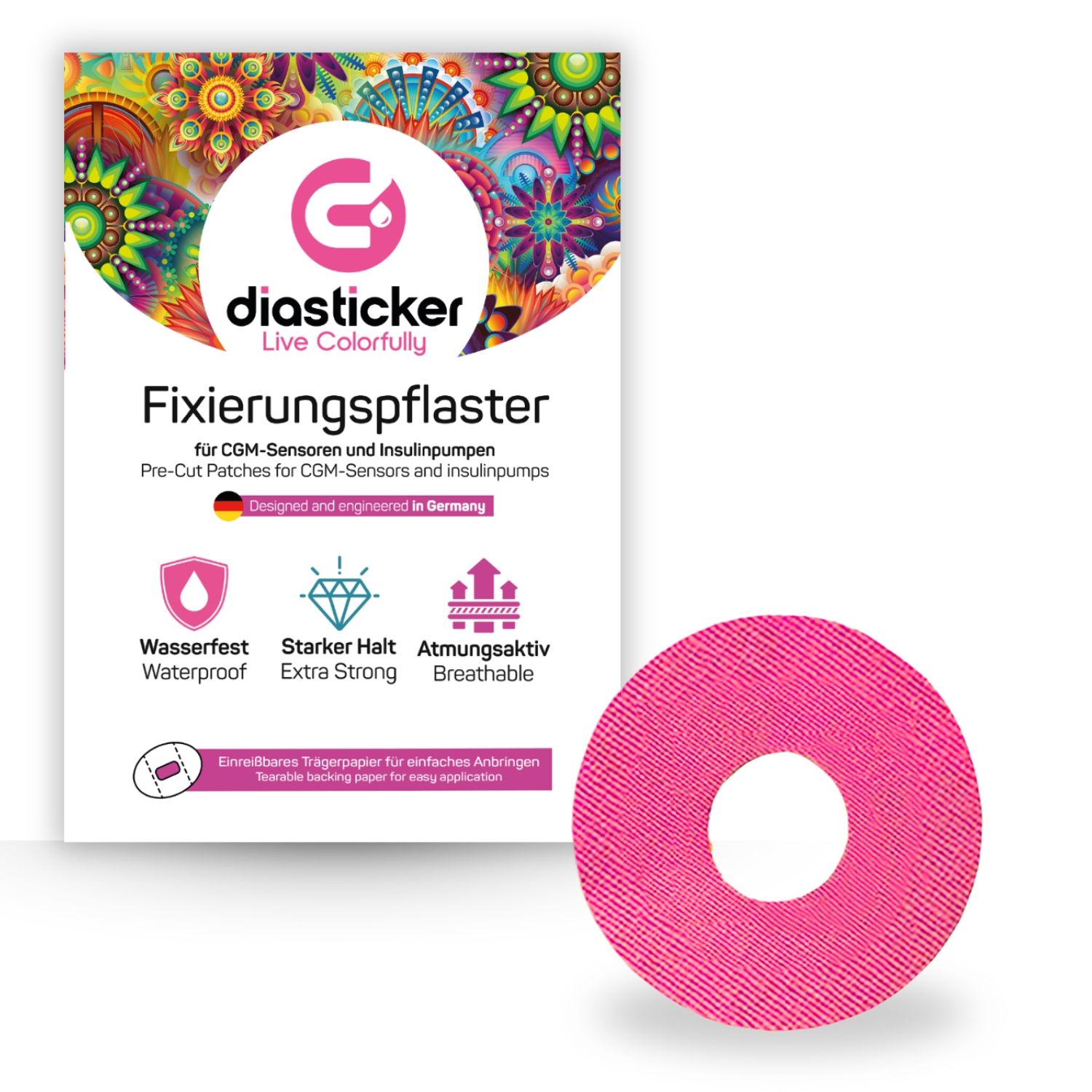 Rosa Fixierpflaster mit Loch, neben Verpackung. Verpackung mit Logo, Text: Fixierungspflaster, wasserfest, atmungsaktiv. Hergestellt in Deutschland.