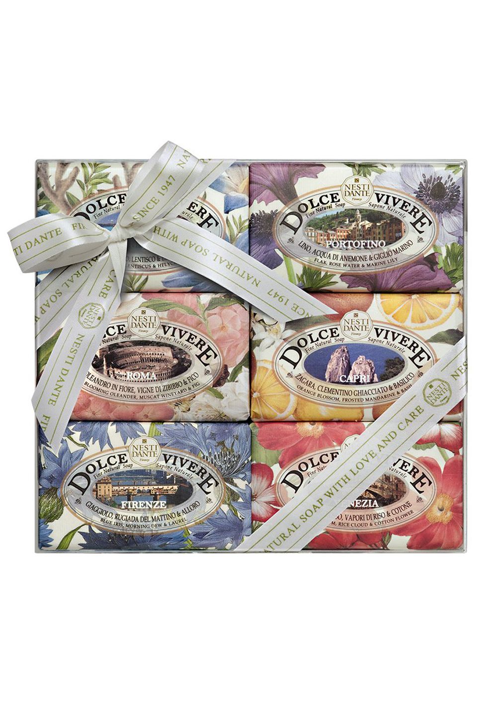 Sechs Seifenstücke in einer Schachtel, mit Schleife. Jede Seife hat ein anderes Blumendesign und den Schriftzug DOLCE VIVERE.