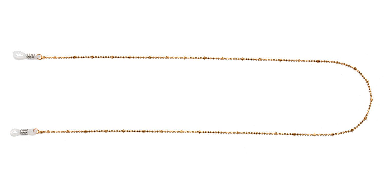Goldfarbene Brillenkette mit Kugeln. An beiden Enden befinden sich transparente Silikon-Schlaufen zur Befestigung an Brillenbügeln.