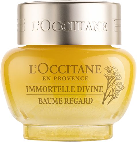 Gelb-transparenter Tiegel mit silbernem Deckel. Aufschrift: L'Occitane, Immortelle Divine Baume Regard.