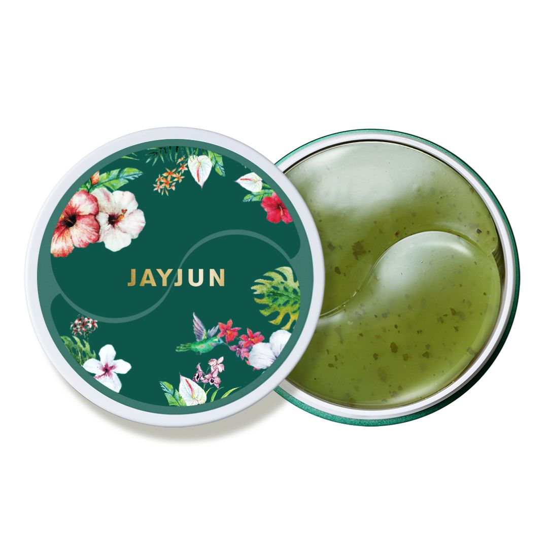 Runde Dose mit Deckel, grüne Augen-Gel-Pflaster. Deckel mit floralem Muster und Schriftzug JAYJUN. Offene Dose mit Augenpflastern.