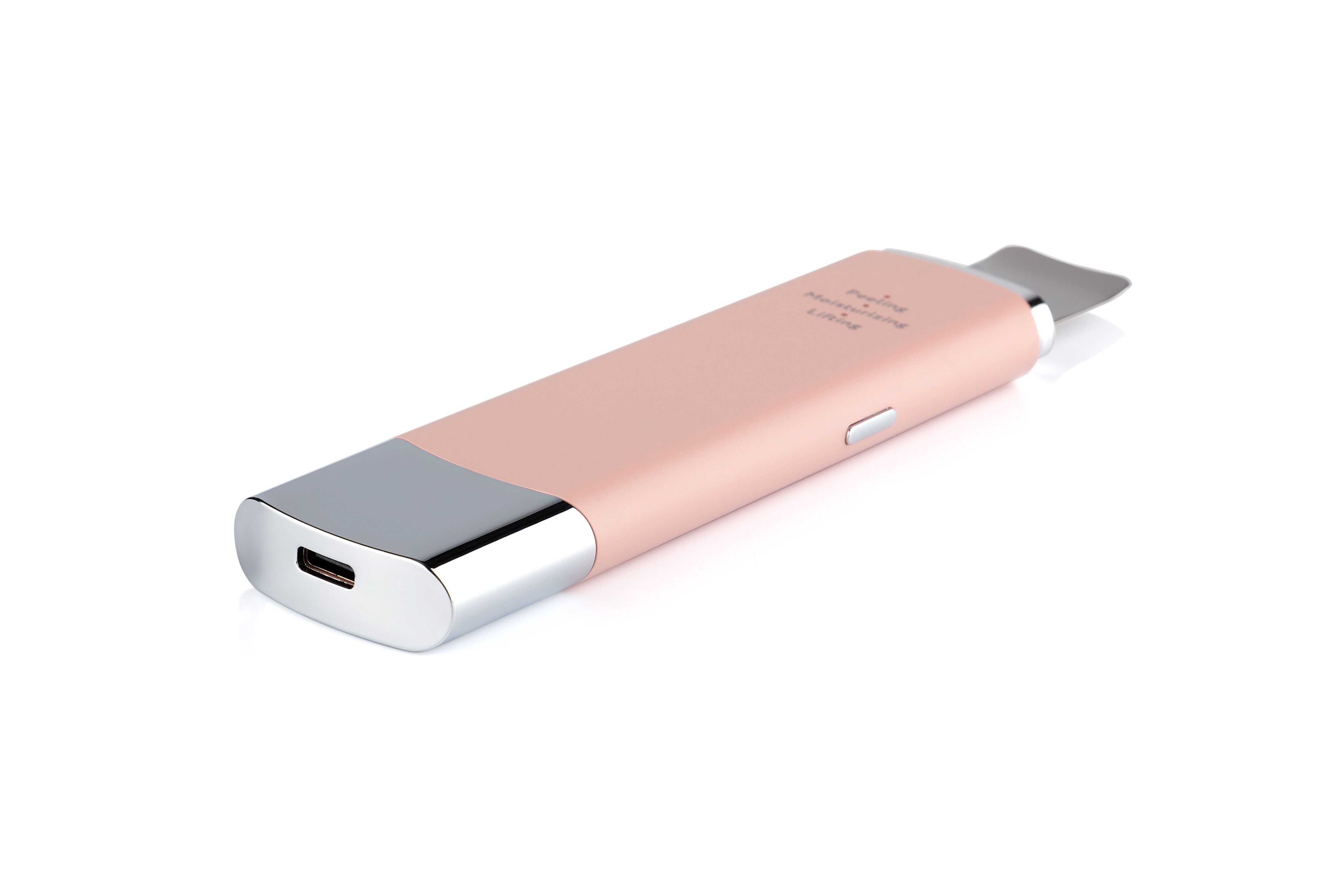 Kavitationspeeling in Rosa mit silbernen Akzenten. USB-Anschluss sichtbar. Auf weißem Hintergrund.