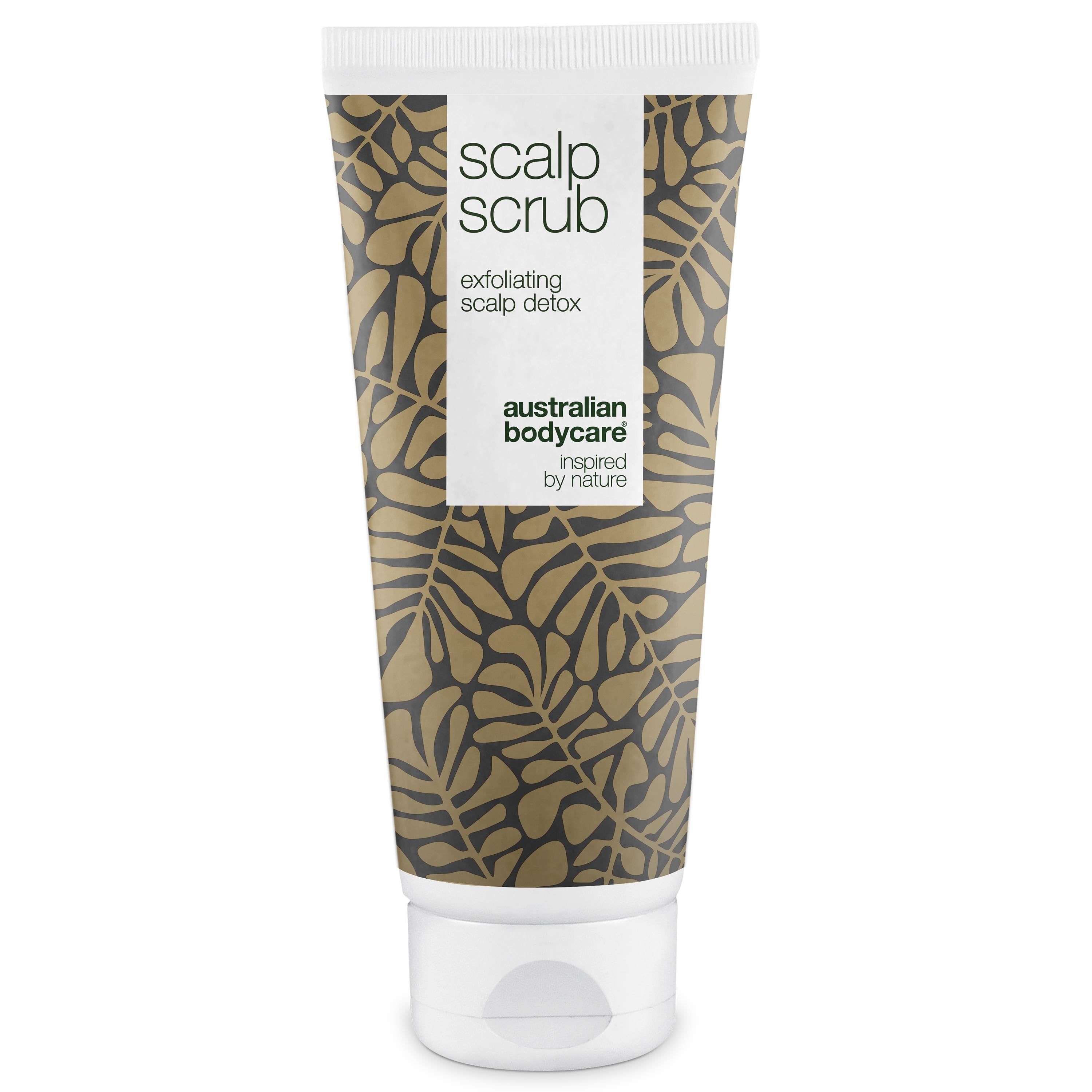 Tube hoofdhuidpeeling. Witte dop, gouden patroon. Tekst: Scalp Scrub, Australian Bodycare.