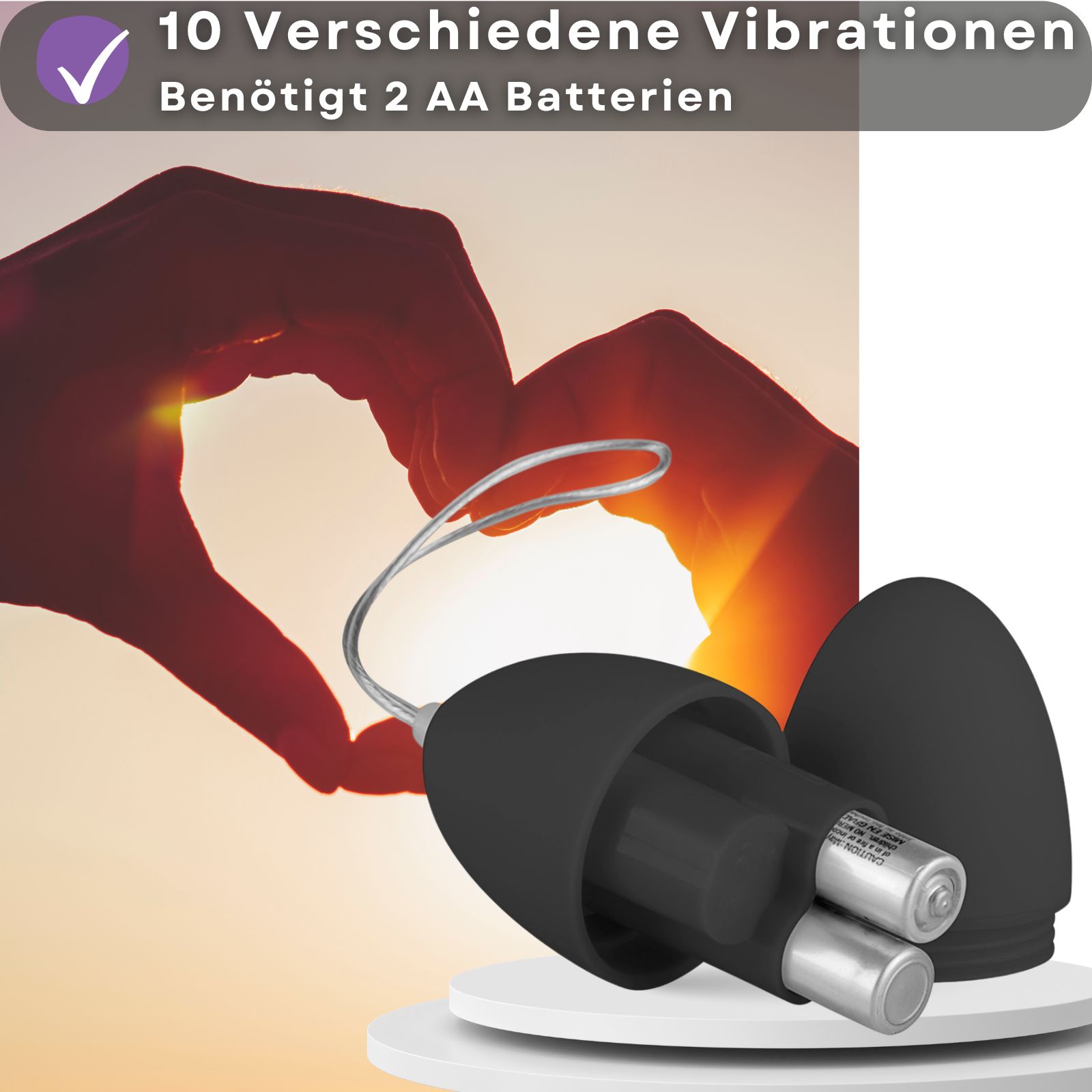 Schwarzer Ei-Vibrator mit geöffneter Hülle. Zwei Batterien sichtbar. Text über Vibrationen.