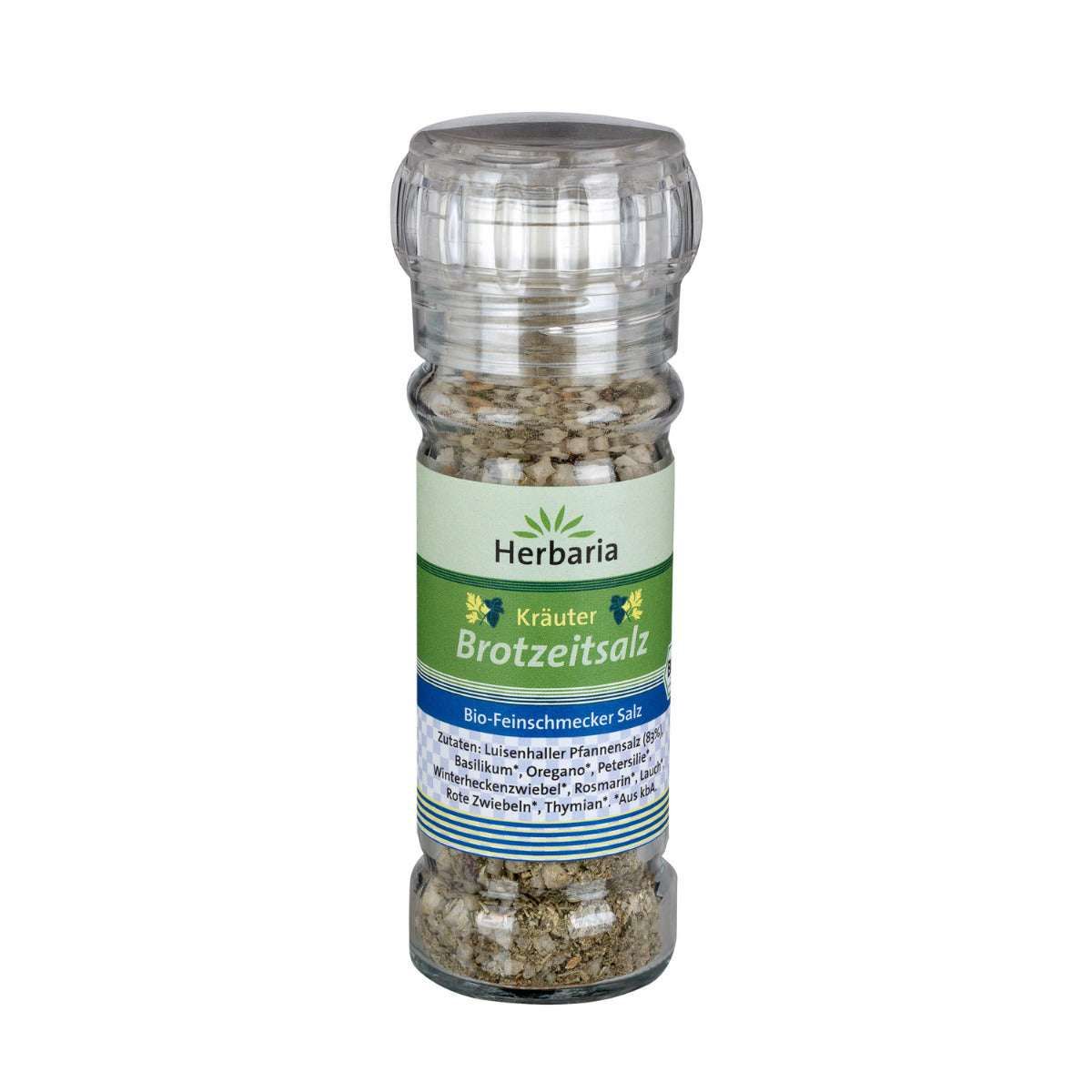 Transparente Gewürzmühle mit Kräutersalz. Aufkleber mit Produktnamen und Zutaten. Deckel und Mahlwerk aus Kunststoff.
