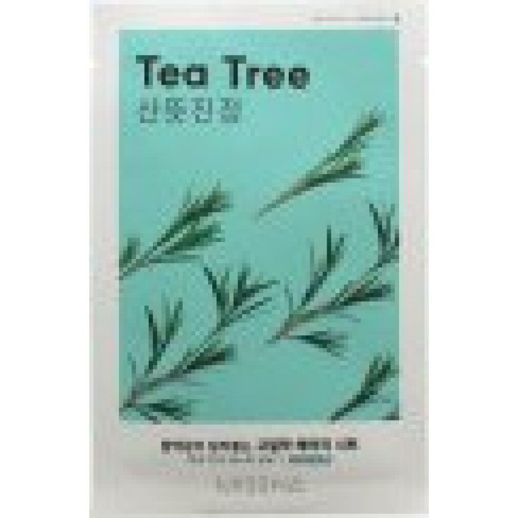 Verpackung mit "Tea Tree" und Zweigen. Marke Missha. Text in koreanischer Schrift.