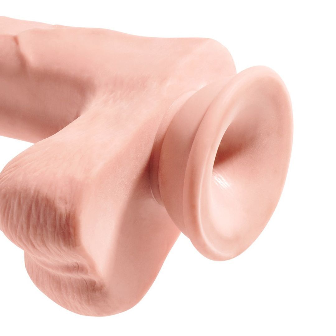 Nahaufnahme des Saugnapfes eines beigefarbenen Dildos. Der Saugnapf ist rund und hat eine Öffnung.