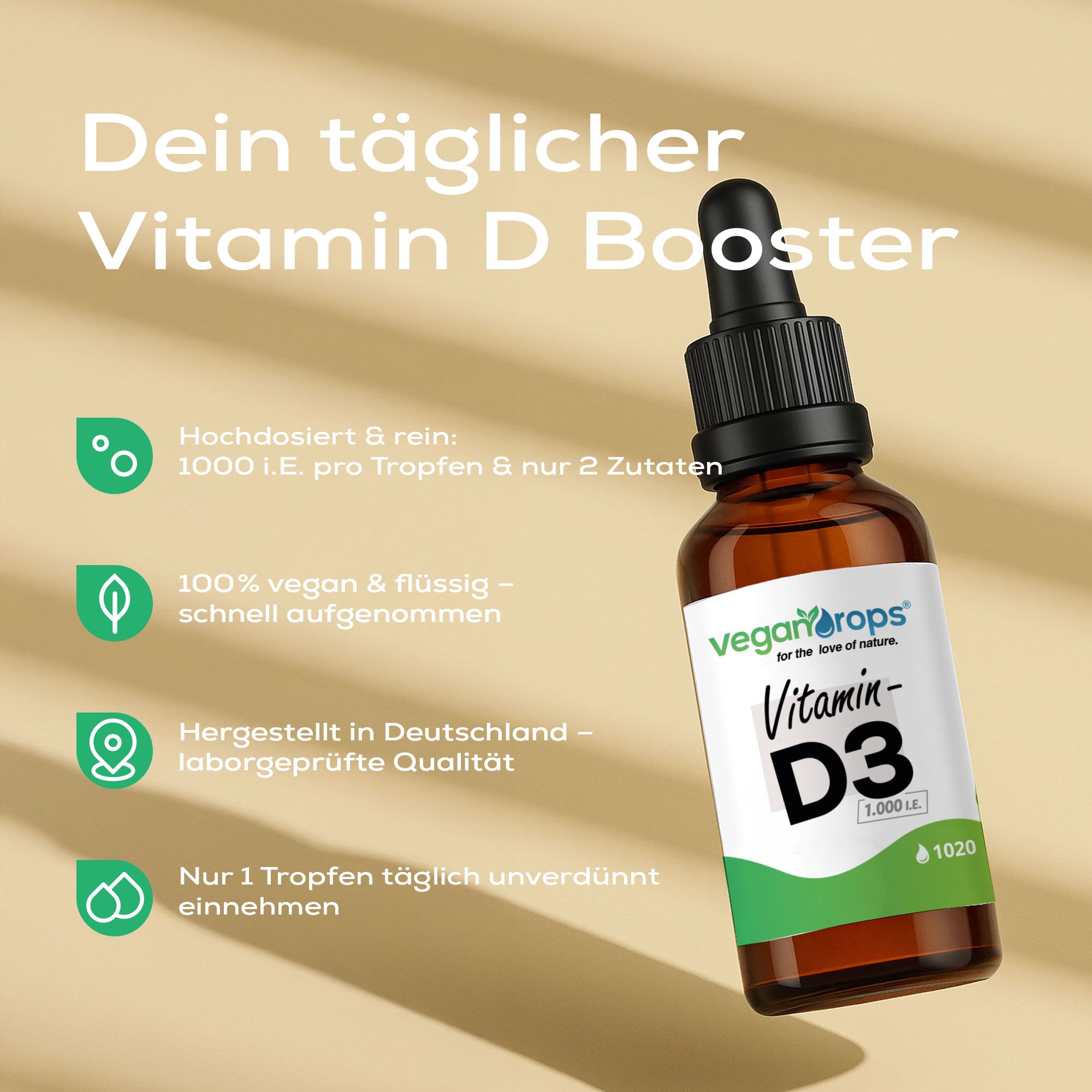 Braune Flasche mit schwarzem Verschluss. Auf dem Etikett steht "Vegan Drops" und "Vitamin D3". Text: "Dein täglicher Vitamin D Booster".