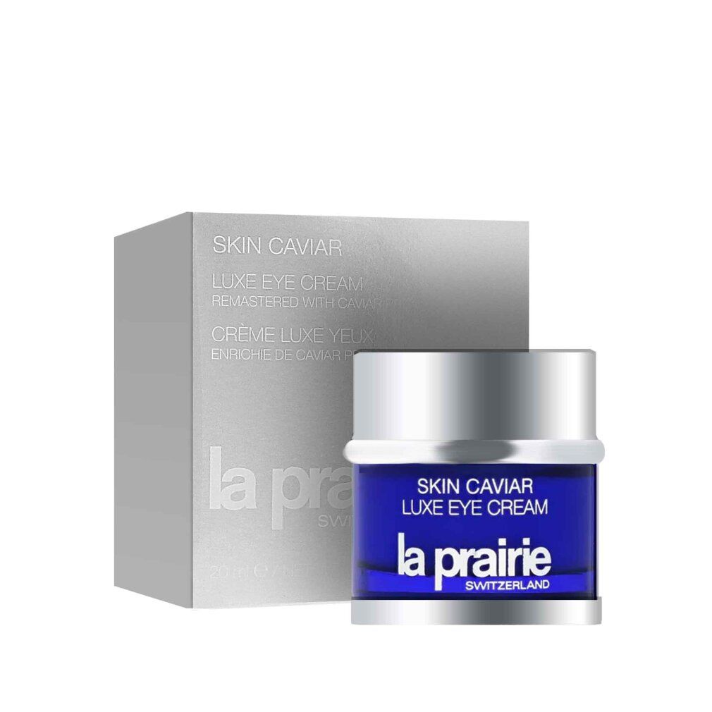 Blaues Glas mit silbernem Deckel und Schachtel. Aufschrift: Skin Caviar Luxe Eye Cream, La Prairie, Switzerland.