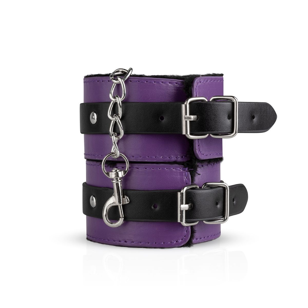 Handfesseln. Lila Leder, schwarze Riemen mit Schnallen. Fellfutter. Kette mit Karabinerhaken.