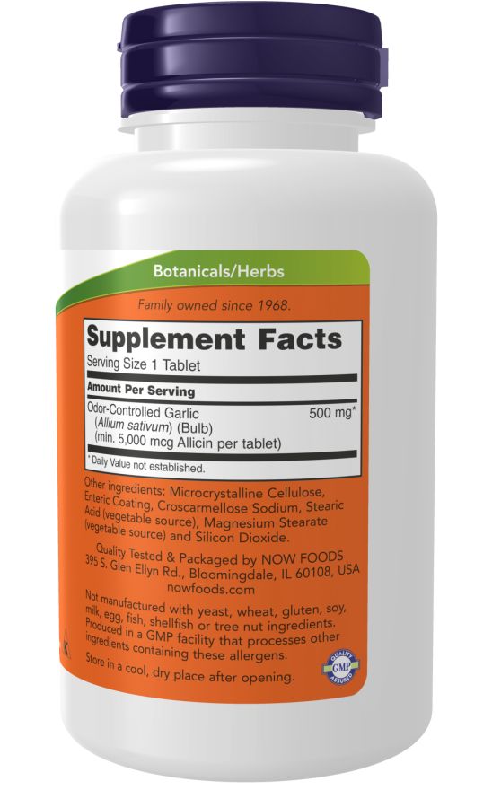 Rückseite der Flasche. Orangefarbenes Etikett mit Nährwertangaben. Inhaltsstoffe und Herstellerinformationen. Weißer Behälter.