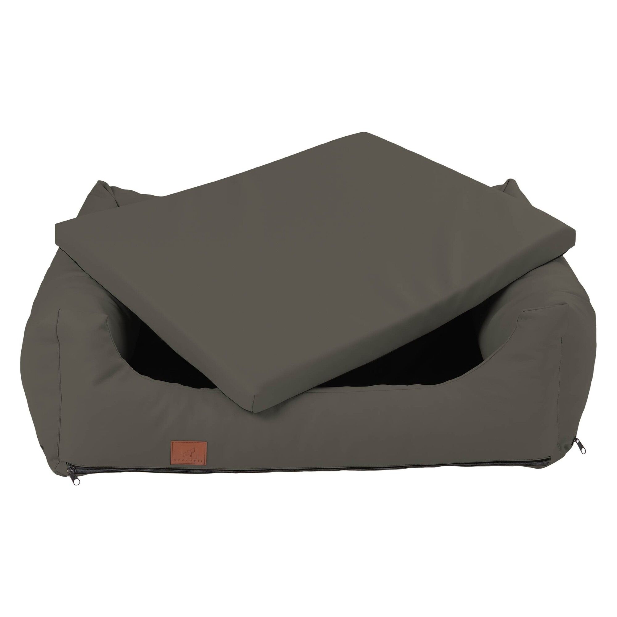 Hundebett, taupefarbenes Kunstleder, rechteckig, mit geöffnetem Deckel. Braunes Label.