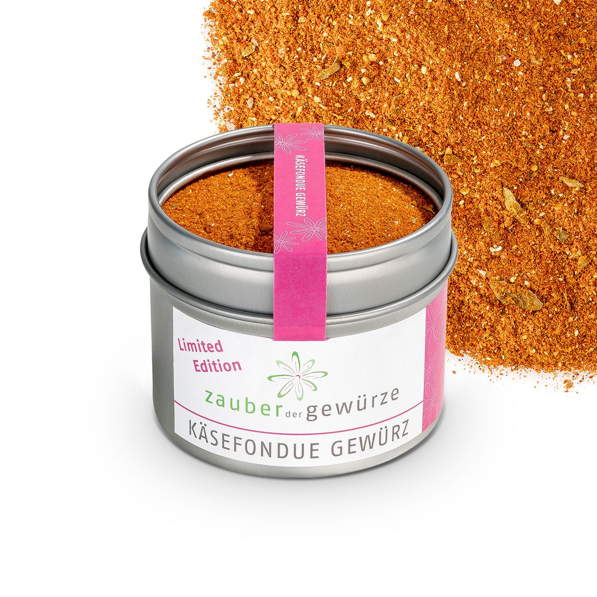 Geöffnete Dose Käsefondue Gewürz. Rosa Etikett mit Schriftzug. Gewürz daneben verstreut.