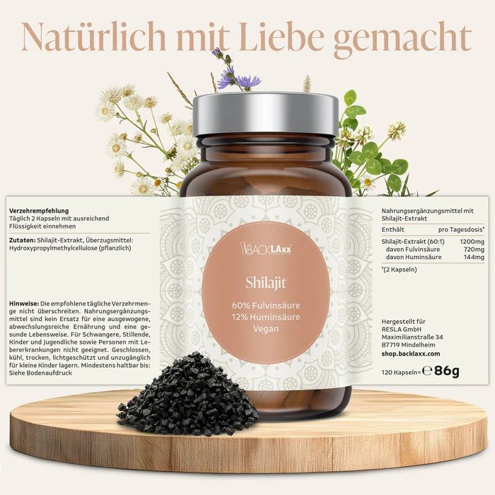 Braune Glasflasche mit Kapseln. Etikett mit Produktinformationen. Schwarzes Pulver. Text.