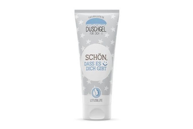 Duschgel-Tube mit Sternenmuster. Text: "Schön, dass es Dich gibt". Unterhalb: "Lotusblüte".