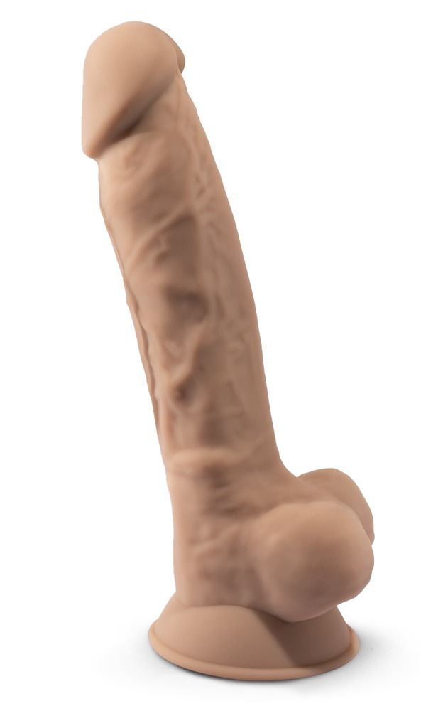 Beiger Dildo. Form mit ausgeprägten Details. Basis mit Saugnapf.