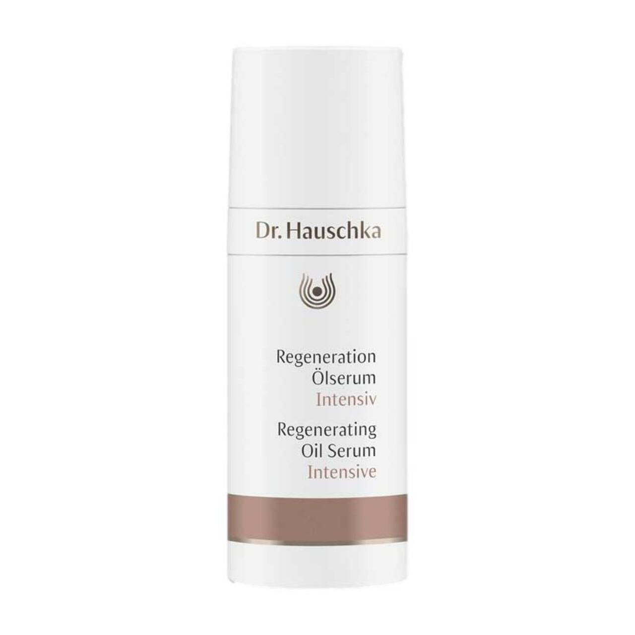Weißer Spender Dr. Hauschka Regeneration Ölserum Intensiv. Text: Regenerating Oil Serum Intensive. Brauner Streifen am unteren Ende.