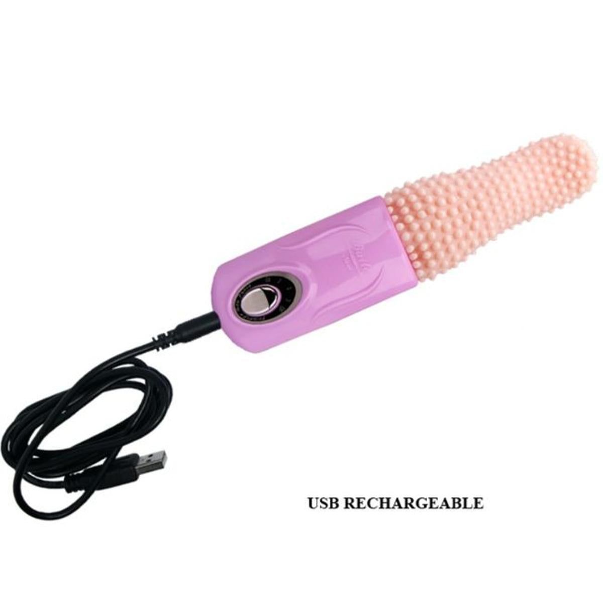 Lila Massagegerät mit texturierter Spitze. Mit USB-Anschluss. Aufschrift: USB RECHARGEABLE.