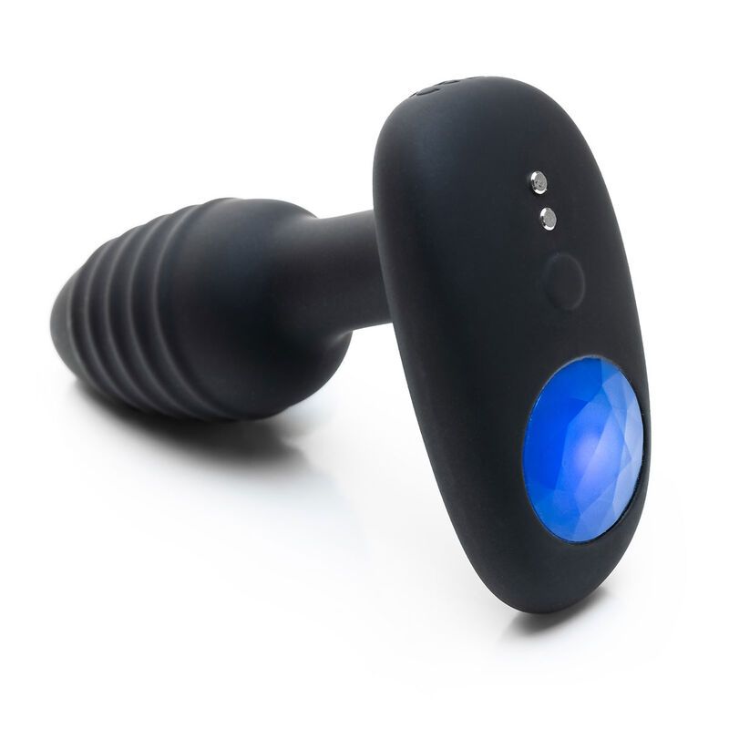 Schwarzer Vibrationsplug mit gerippter Spitze und ovalem Griff mit blauem Licht.