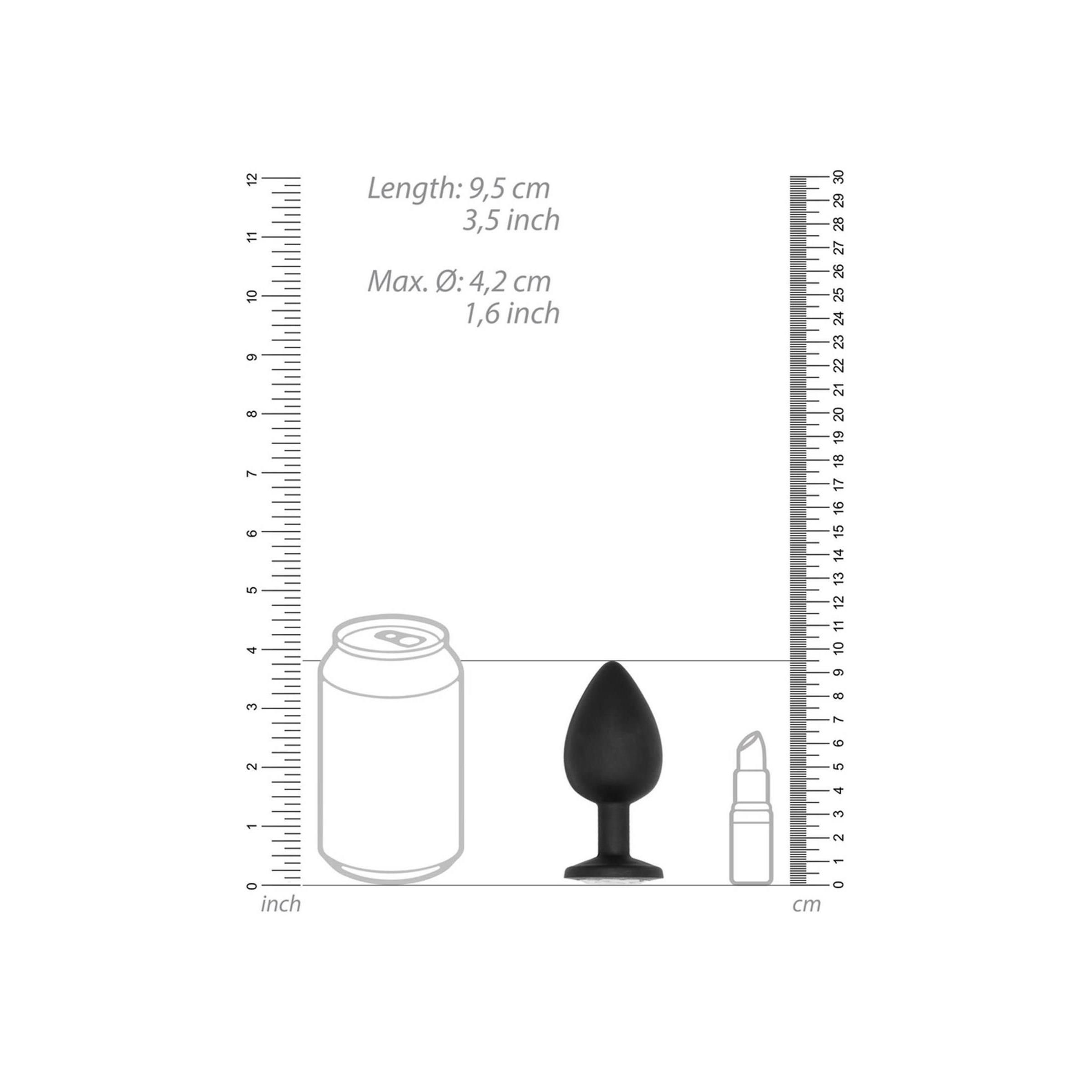 Schwarzer Butt Plug neben einer Dose und einem Lippenstift. Maße: 9,5 cm Länge, 4,2 cm max. Ø.