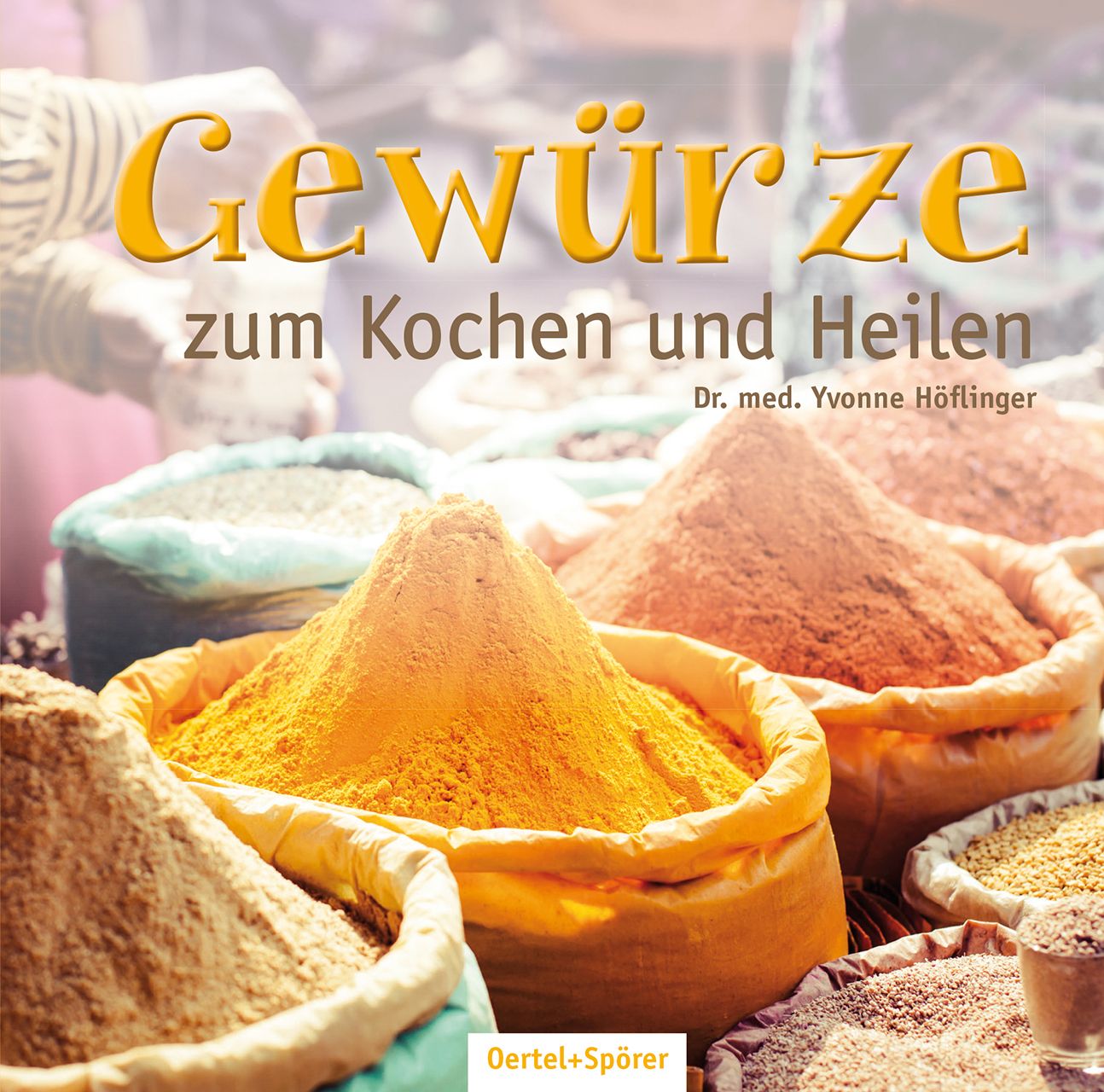 Buchcover mit dem Titel "Gewürze zum Kochen und Heilen". Gelber Titel, darunter Text. Im Hintergrund Gewürzsäcke.