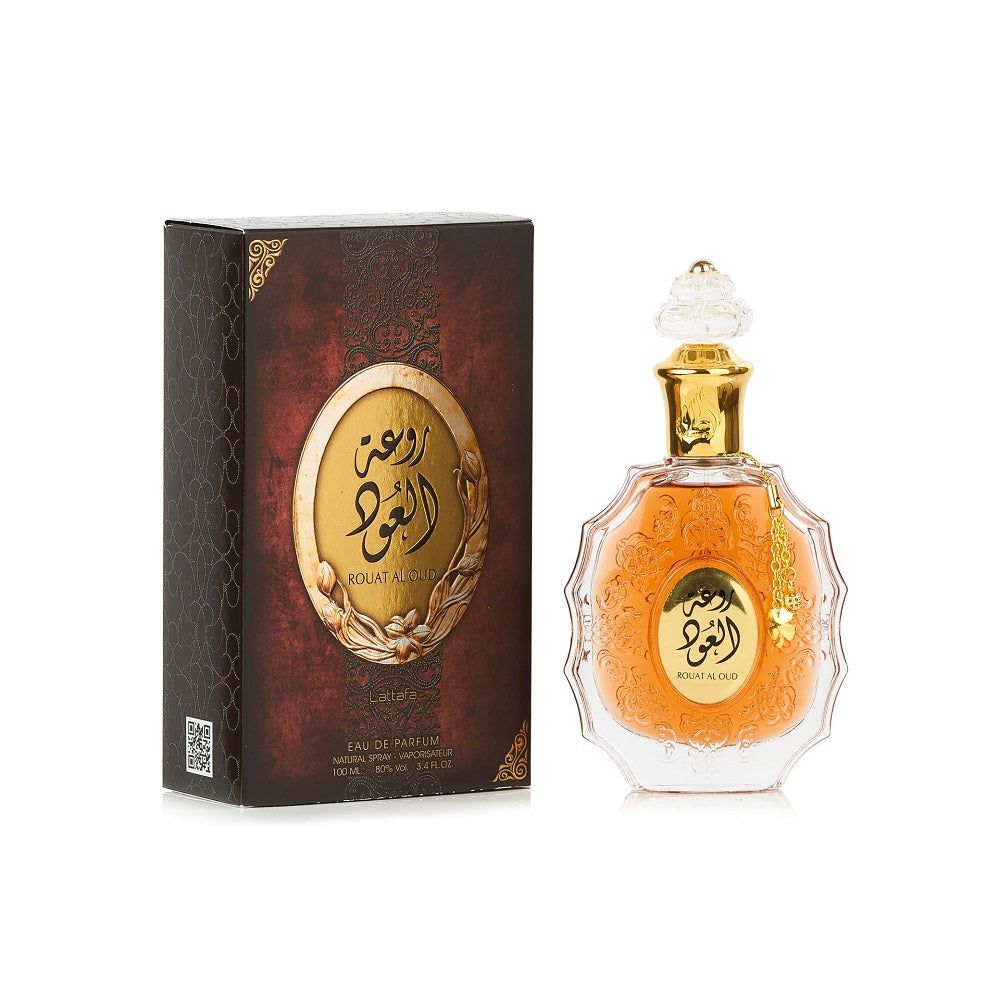 Parfümflakon und -verpackung. Goldfarbener Flakon mit Deckel. Braune Verpackung mit goldfarbenen Details und arabischer Schrift.
