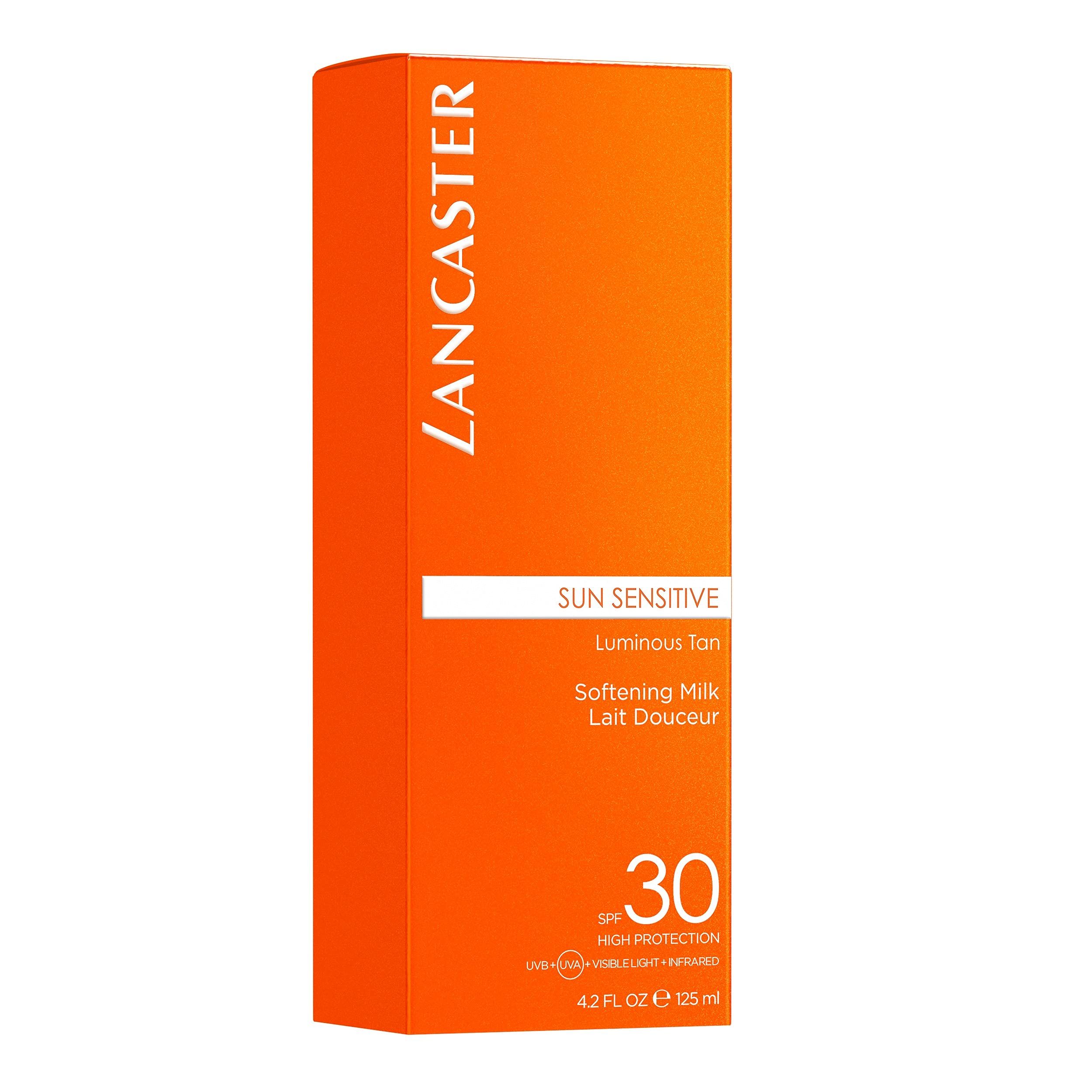 Orangefarbene Schachtel. Lancaster Sun Sensitive Luminous Tan SPF 30. 4,2 fl oz. Text.