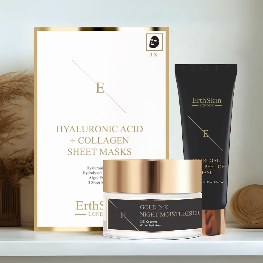 Set mit Nachtcreme, Gesichtsmaske und Kollagenmasken. Goldfarbener Tiegel, schwarze Tube und Packung. ErthSkin London. Auf Regal.