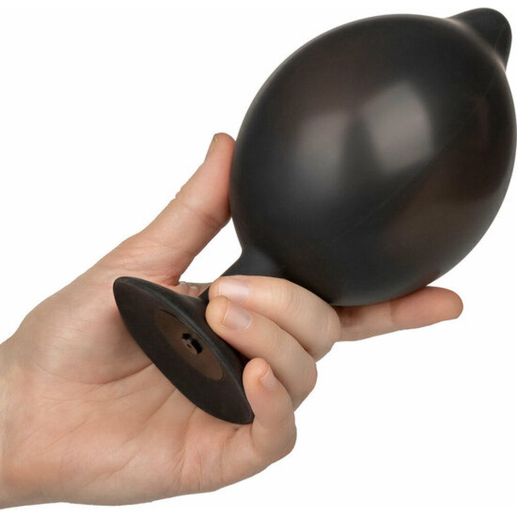 Schwarzer, aufblasbarer Silikon-Plug in einer Hand gehalten. Die Basis ist sichtbar.
