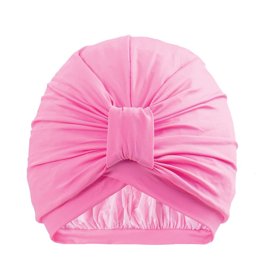 Rosa Duschhaube. Oberteil mit Knoten, Innenfutter. Baumwoll-Design. Für Wellness und Gesundheit.