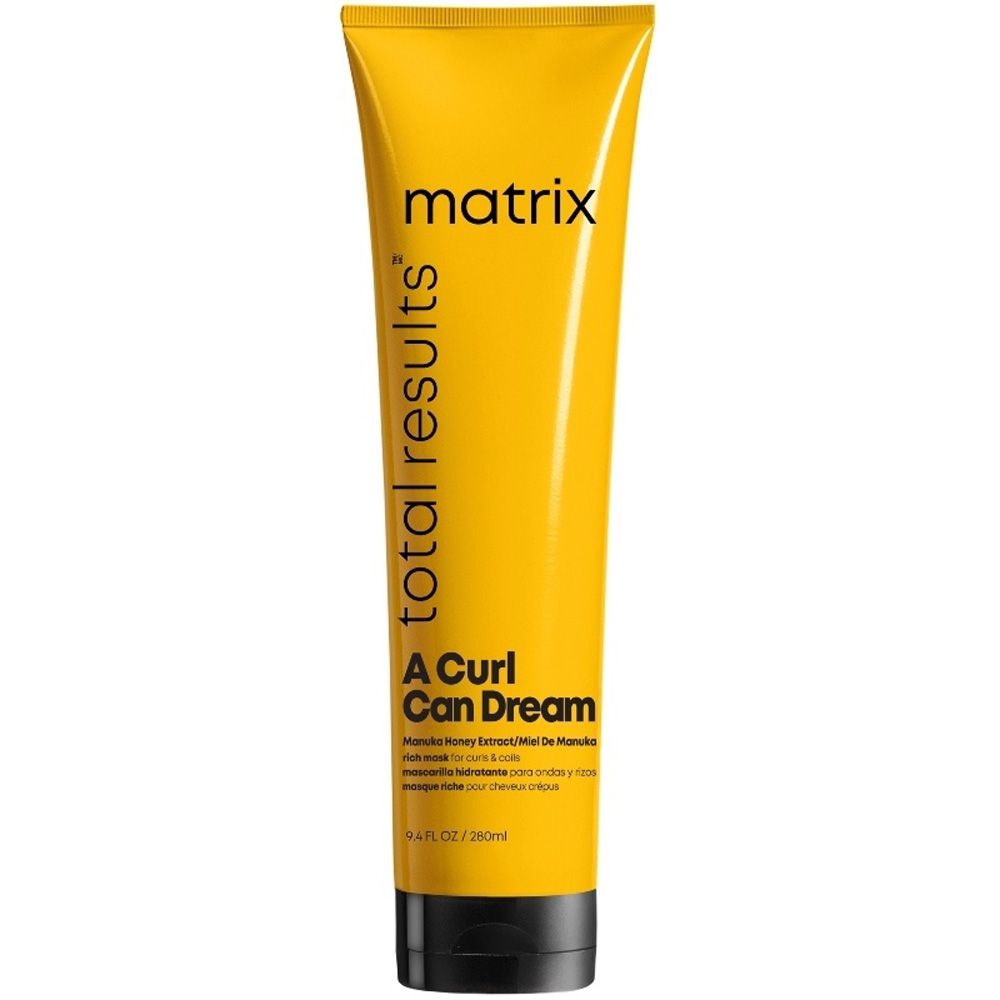 Gelbe Tube mit schwarzem Deckel. Aufschrift: matrix, Total Results, A Curl Can Dream. Produktbezeichnung und Inhaltsstoffe.