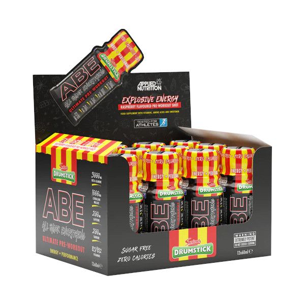 Verpackung mit ABE Drumstick Shots. Mehrere kleine Flaschen in einer Schachtel. Aufdruck: Explosive Energy, Sugar Free, Zero Calories. Gelb und rote Farbkombination.