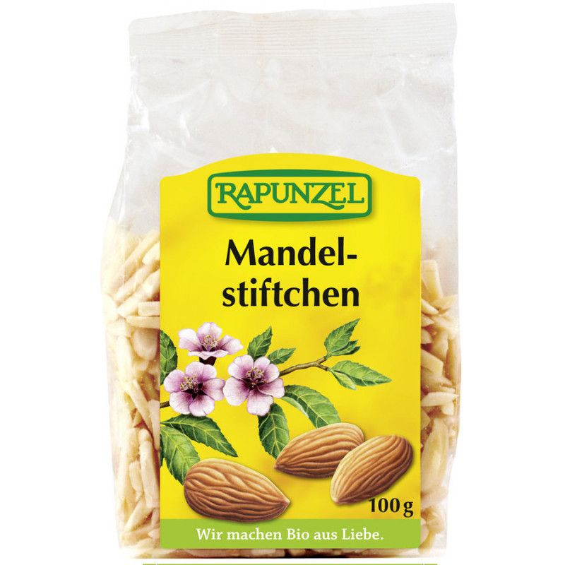 Klarsichtbeutel mit Mandelstiftchen. Gelbes Etikett mit "RAPUNZEL"-Logo, Produktname, Mandeln, Blüten und "100g".