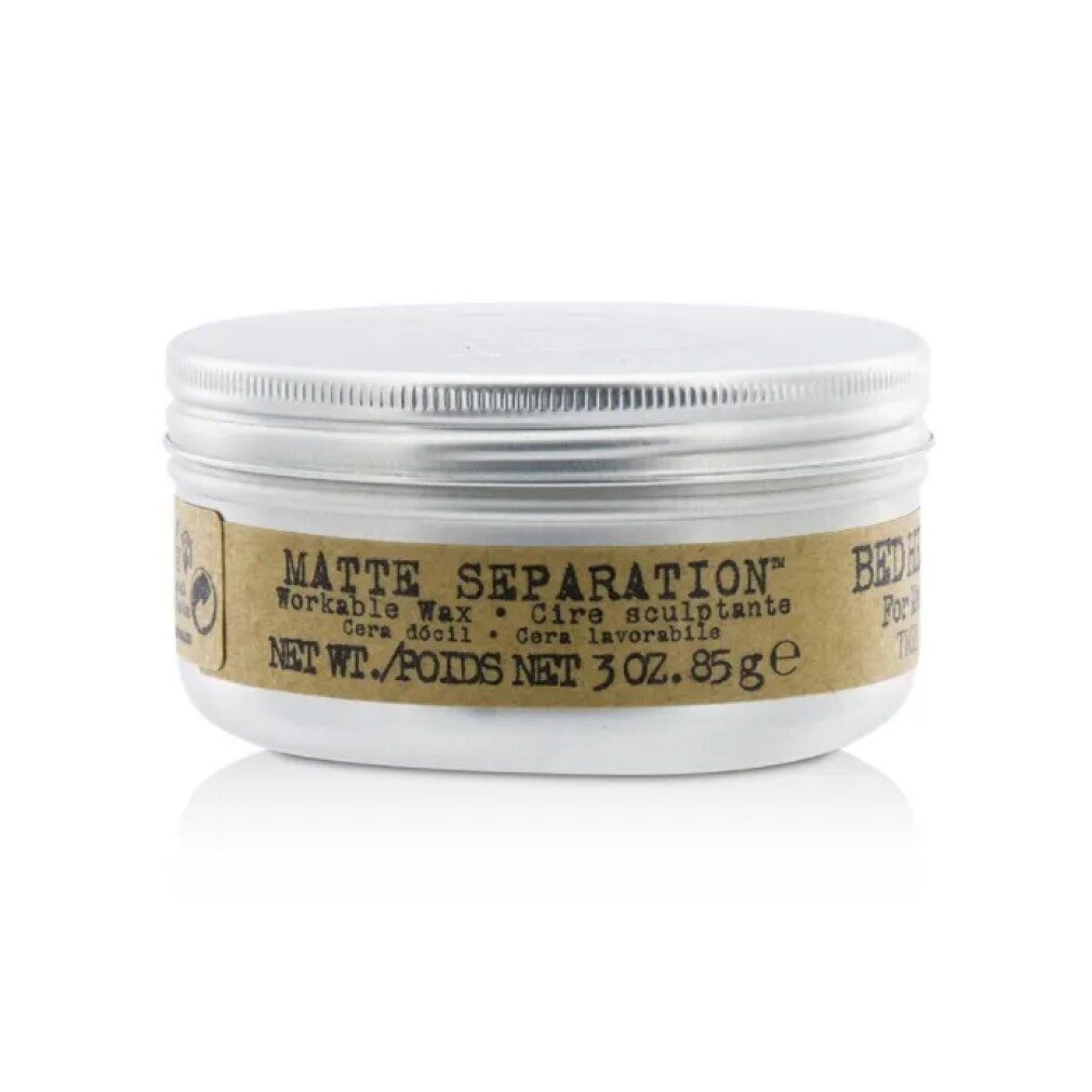 Runde Dose mit silbernem Deckel. Aufkleber mit "Matte Separation Workable Wax" und "Bed Head For Men Tigi".