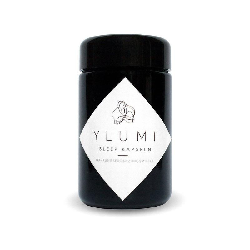 Schwarze Dose mit weißem Etikett. Aufschrift: YLUMI SLEEP KAPSELN. Nahrungsergänzungsmittel.