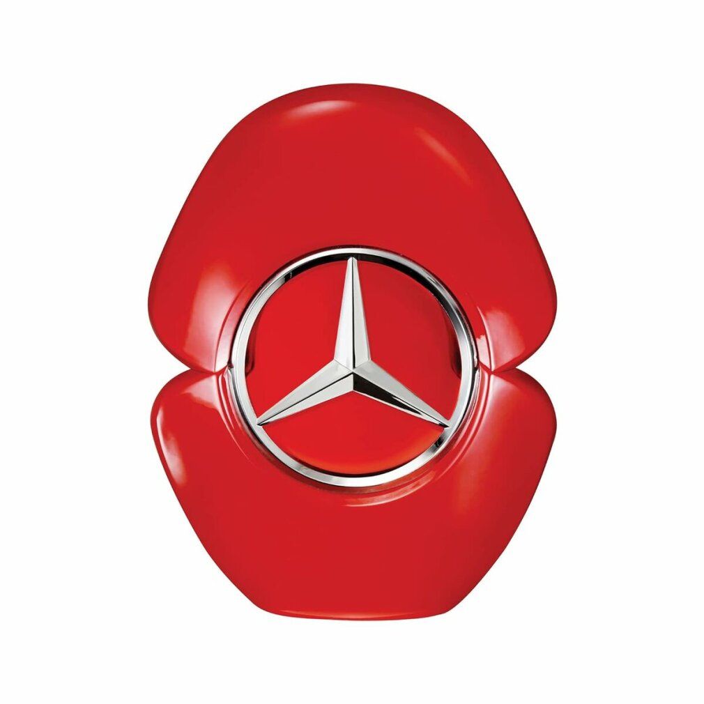 Rote Parfümflasche mit silbernem Mercedes-Benz-Logo. Ovale Form mit abgerundeten Enden. Glänzende Oberfläche.