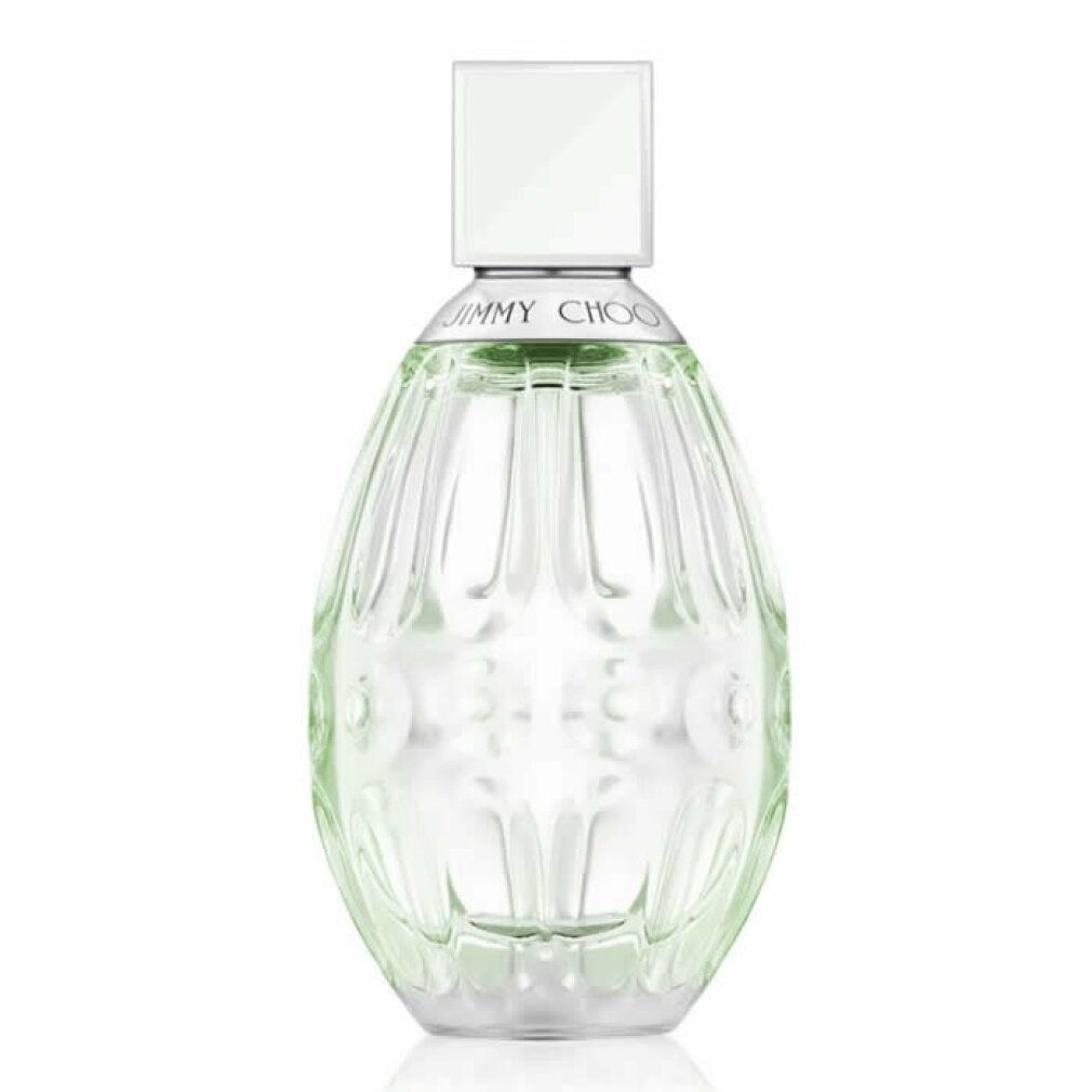 Parfümflasche mit grünlichem Inhalt. Tropfenförmige Flasche mit geriffelter Oberfläche und quadratischem Deckel. Aufschrift: JIMMY CHOO.