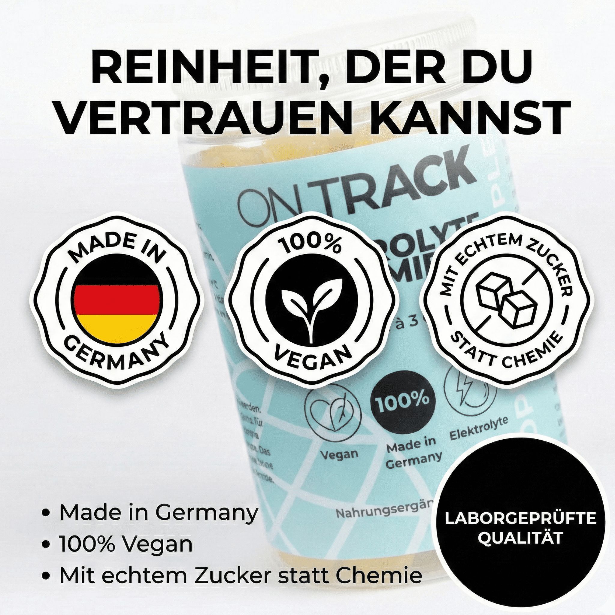 Nahaufnahme von Logos. Aufschrift: Made in Germany, 100% Vegan, Mit echtem Zucker statt Chemie, Laborgeprüfte Qualität.