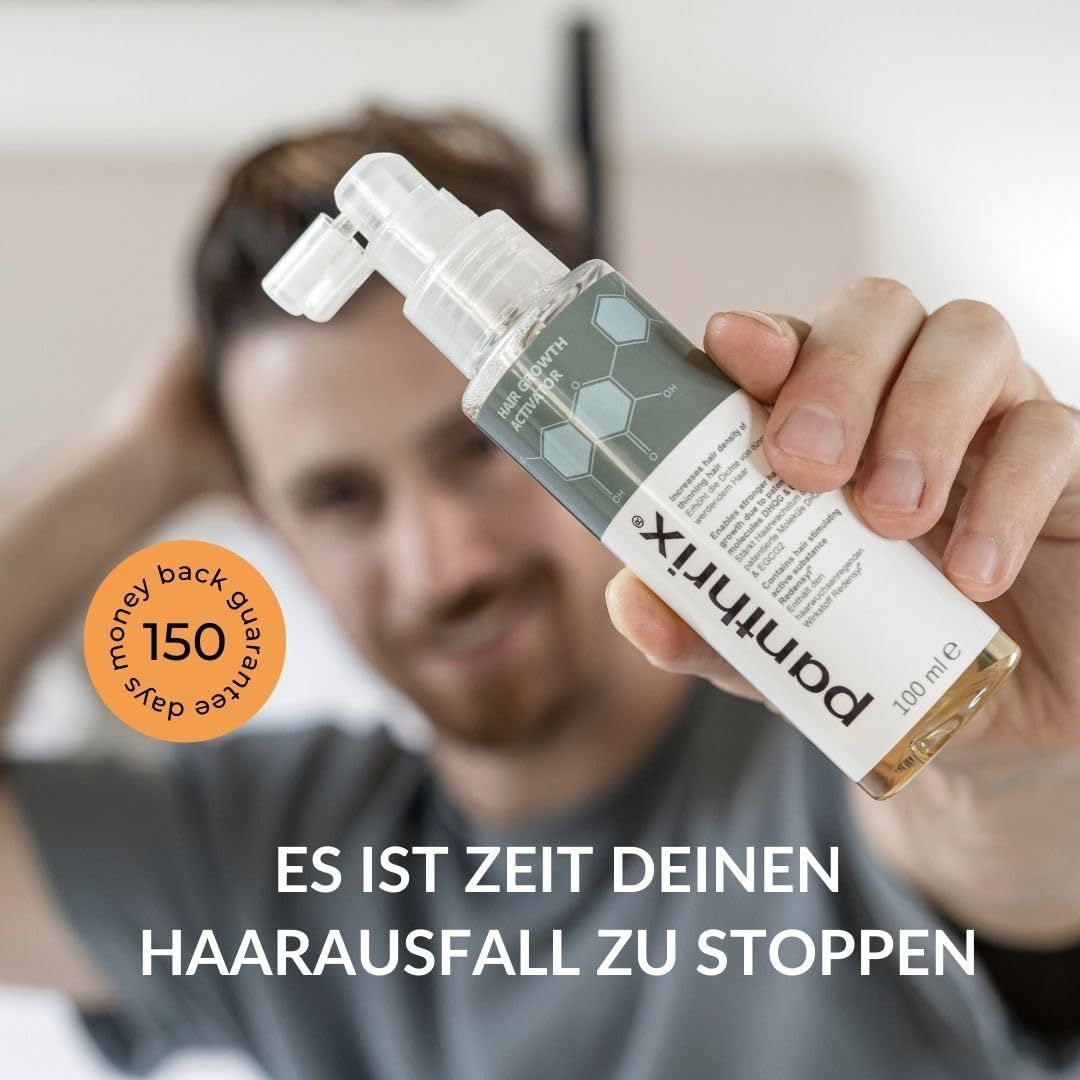 Un homme tient un flacon de produit. Texte : Il est temps d'arrêter votre perte de cheveux. Garantie de remboursement de 150 jours.