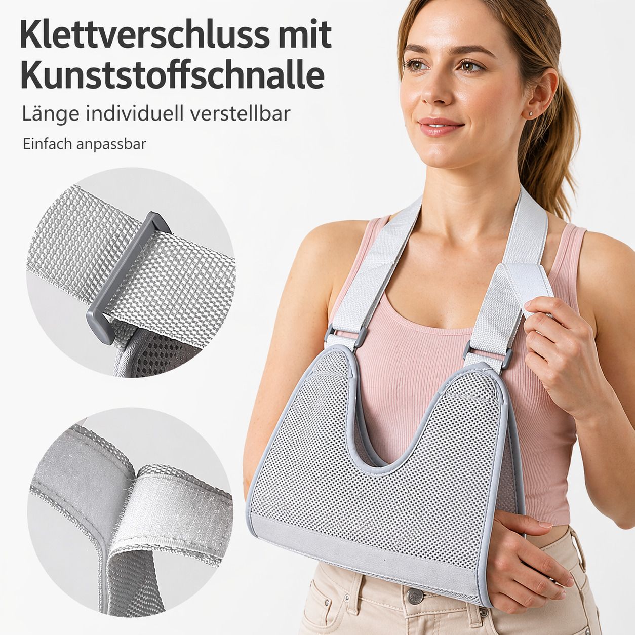 Graue Armschlinge, getragen von einer Frau. Klettverschluss mit Kunststoffschnalle. Länge individuell verstellbar. Atmungsaktives Netzmaterial.
