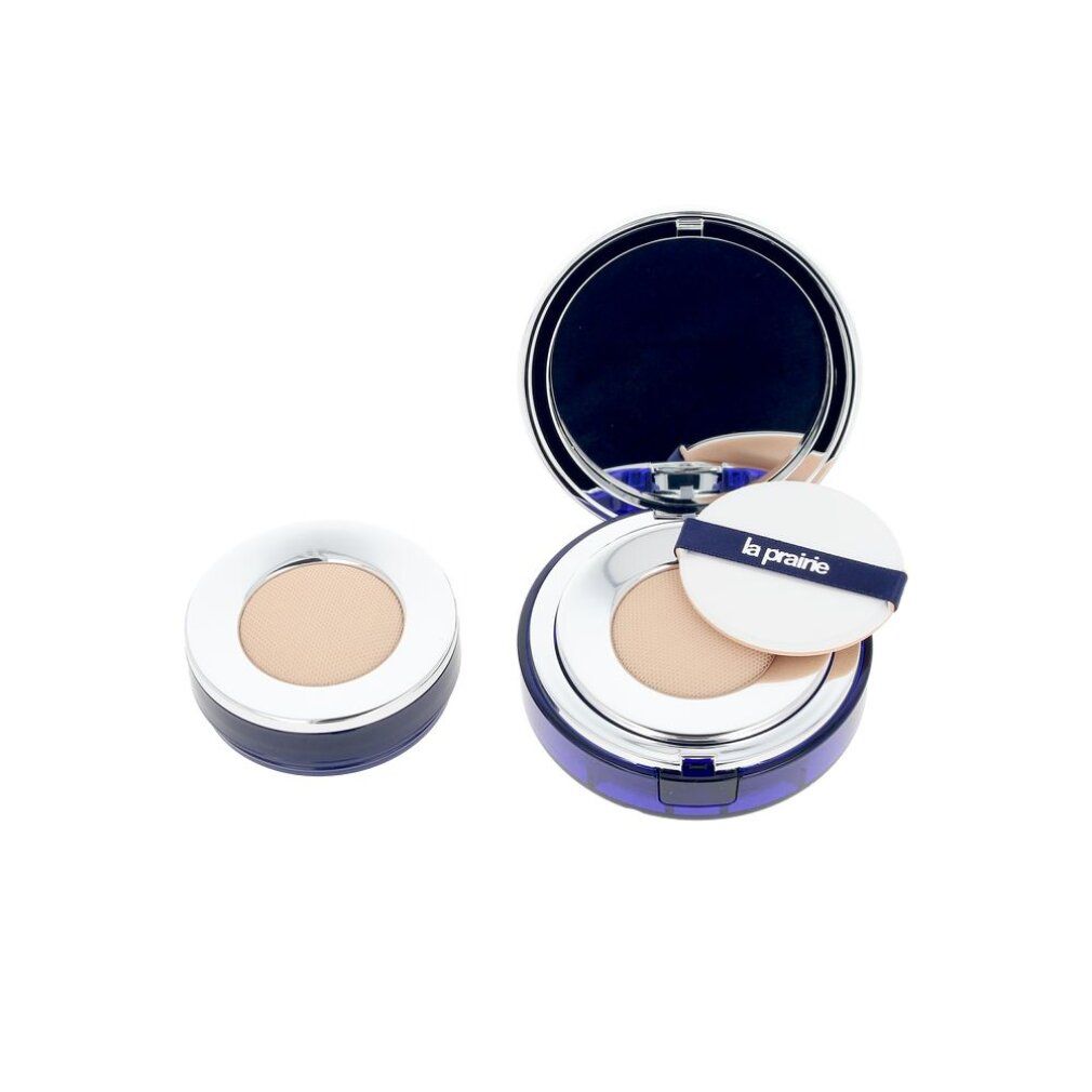 La Prairie Kompaktpuder mit Spiegel und Applikator, daneben eine Nachfüllpackung.