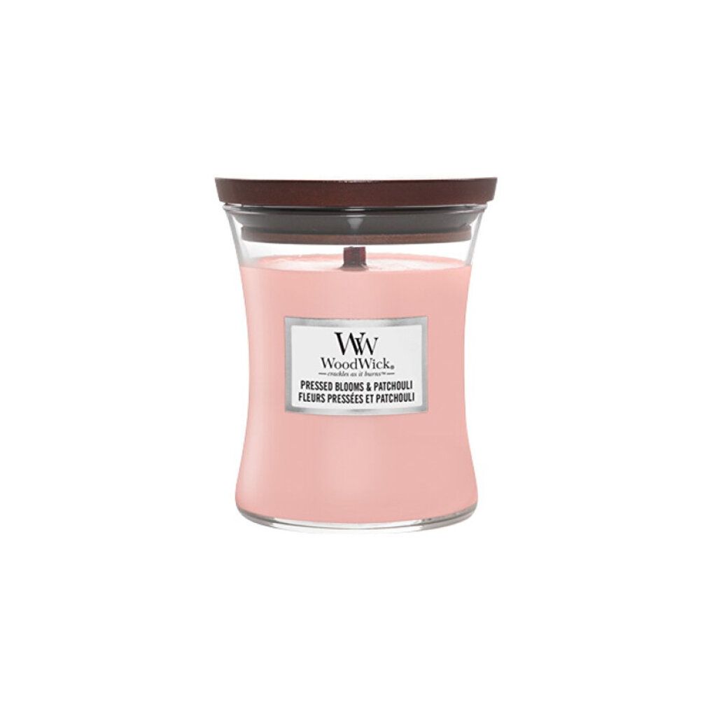 Kerze mit Holzdocht und Deckel. Rosa Wachs in Glasbehälter. Etikett mit Produktnamen und Logo.