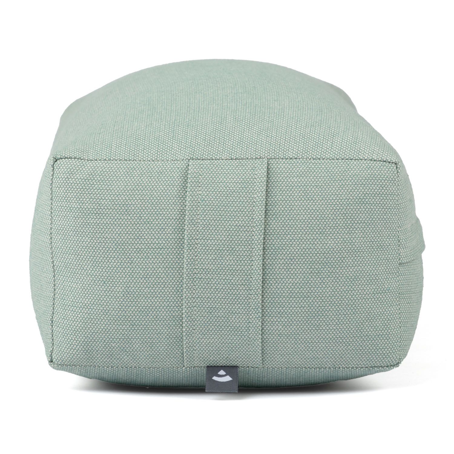 Hellgrünes Yoga-Bolster. Rechteckige Form mit abgerundeten Kanten. Stoffbezug. Logo-Etikett.