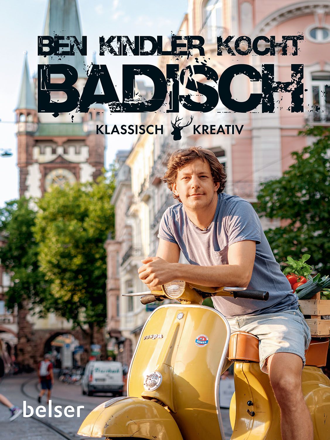 Buchcover: "Ben Kindler kocht badisch". Mann auf gelbem Roller, Hintergrund Stadtansicht.