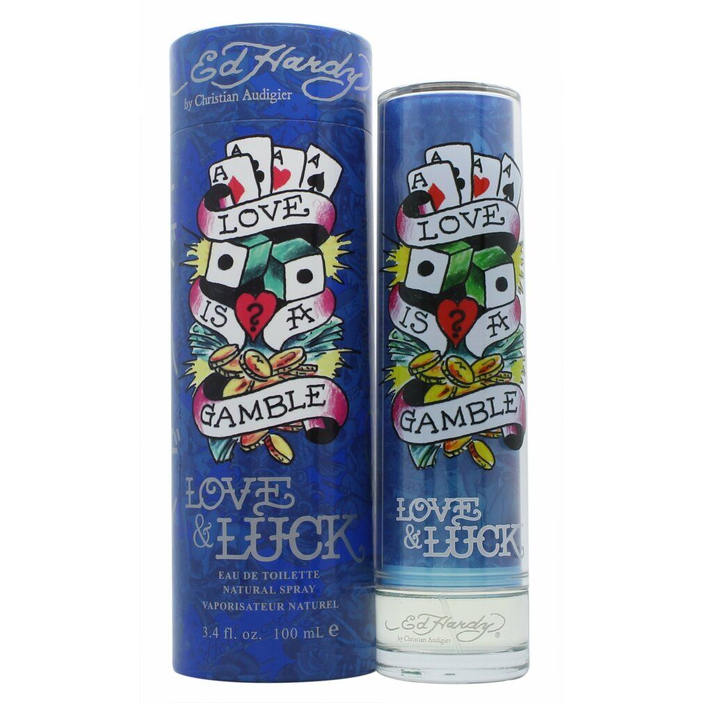 Blaues Eau de Toilette mit zylindrischer Verpackung. Aufschrift: Love & Luck, Ed Hardy. Tattoo-Design mit Spielkarten und Würfeln.