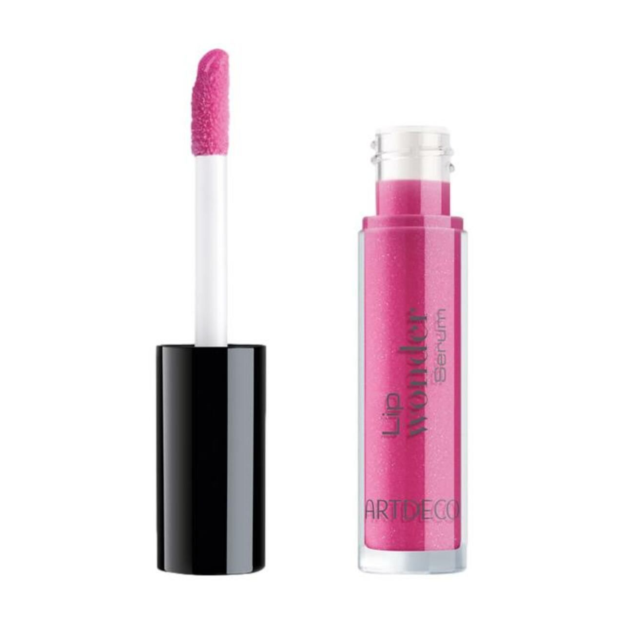 Artdeco Lip Wonder Serum. Geöffnete Tube mit Applikator. Pinkfarbener Inhalt. Schwarzer Deckel.