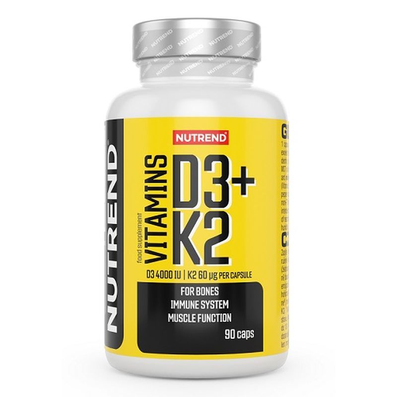 Weiße Flasche mit gelbem Etikett. Aufschrift: NUTREND D3+K2 VITAMINS. Enthält 90 Kapseln. Für Knochen, Immunsystem und Muskelfunktion.