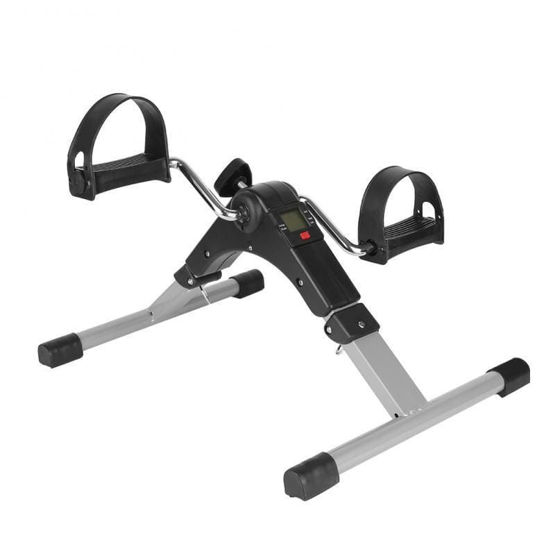 Mini-Heimtrainer. Schwarz-silberfarbenes Gerät mit Pedalen und digitalem Display. Winkelverstellbar, für Arme und Beine.