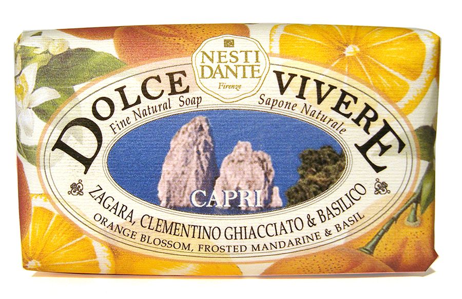 Seife mit Verpackung. Ovales Etikett mit Schriftzug Dolce Vivere Capri. Abbildung von Zitrusfrüchten und Felsen.