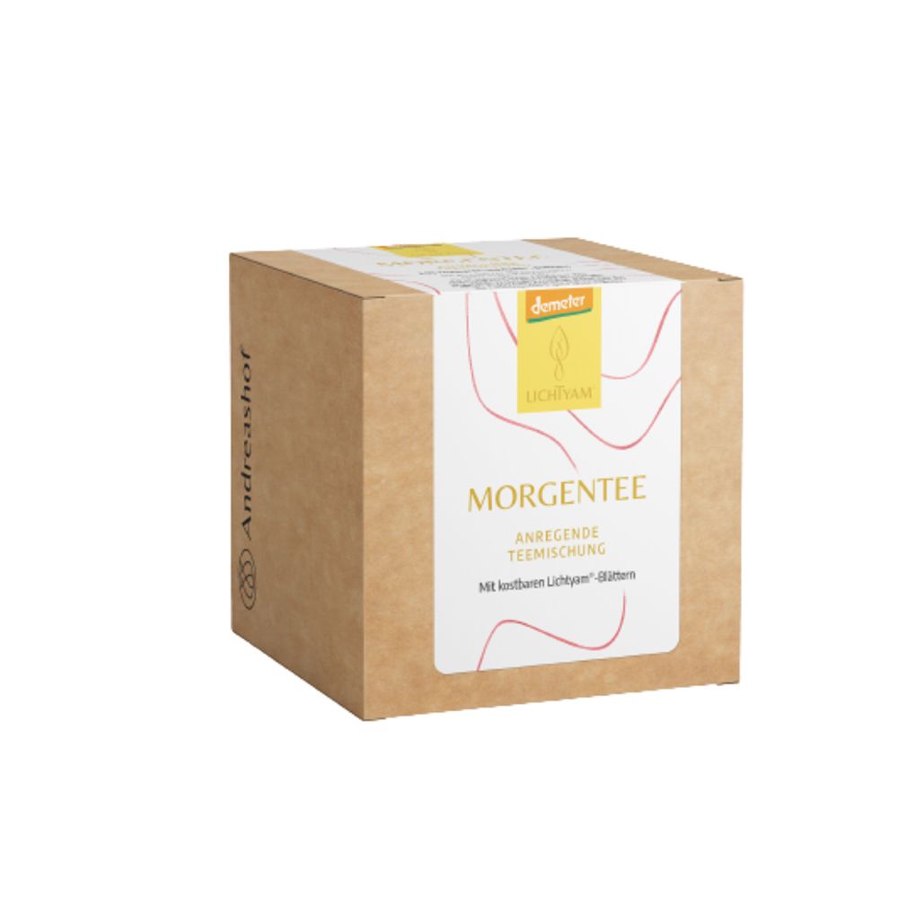Karton mit Aufdruck. Aufkleber mit Logo, Produktname: Morgentee. Braune Verpackung, weißer Aufkleber mit roter Grafik.